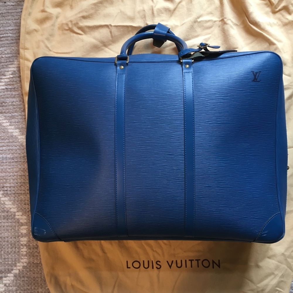 Blue Epi leather Louis Vuitton luggage bag
